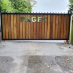 wooden automatic gate for PAGET estate by Mech-Elec Group LTD