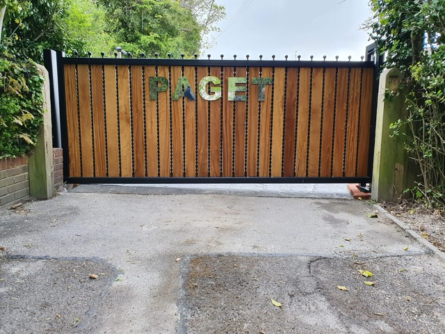 wooden automatic gate for PAGET estate by Mech-Elec Group LTD